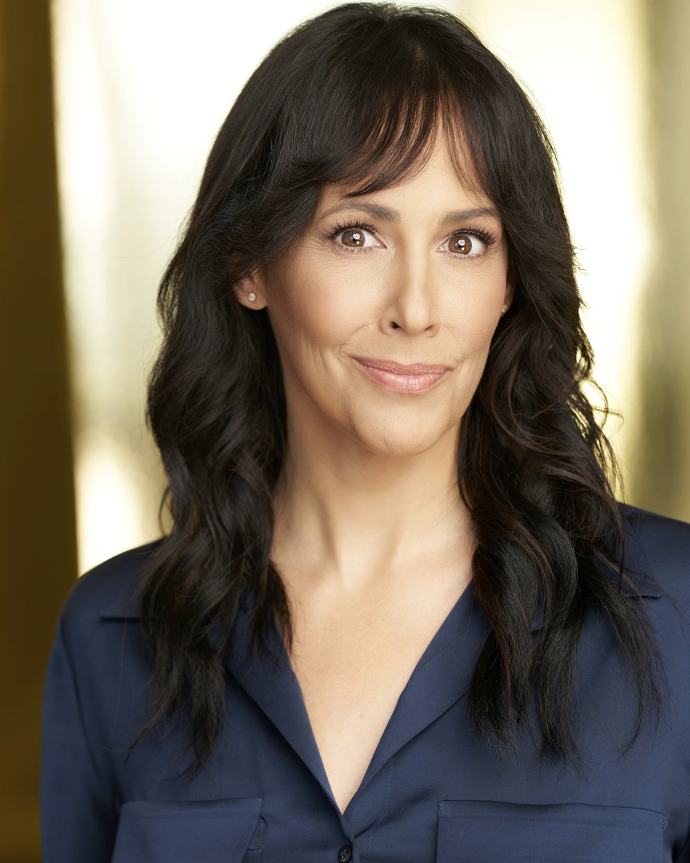 Tara Zoē headshot — warm commercial, soft smile